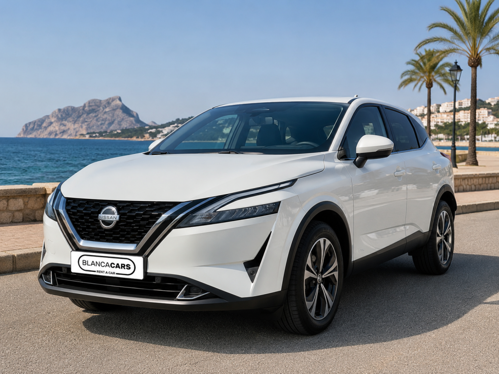 White Nissan Qashqui automatic family SUV in Cumbre del Sol.